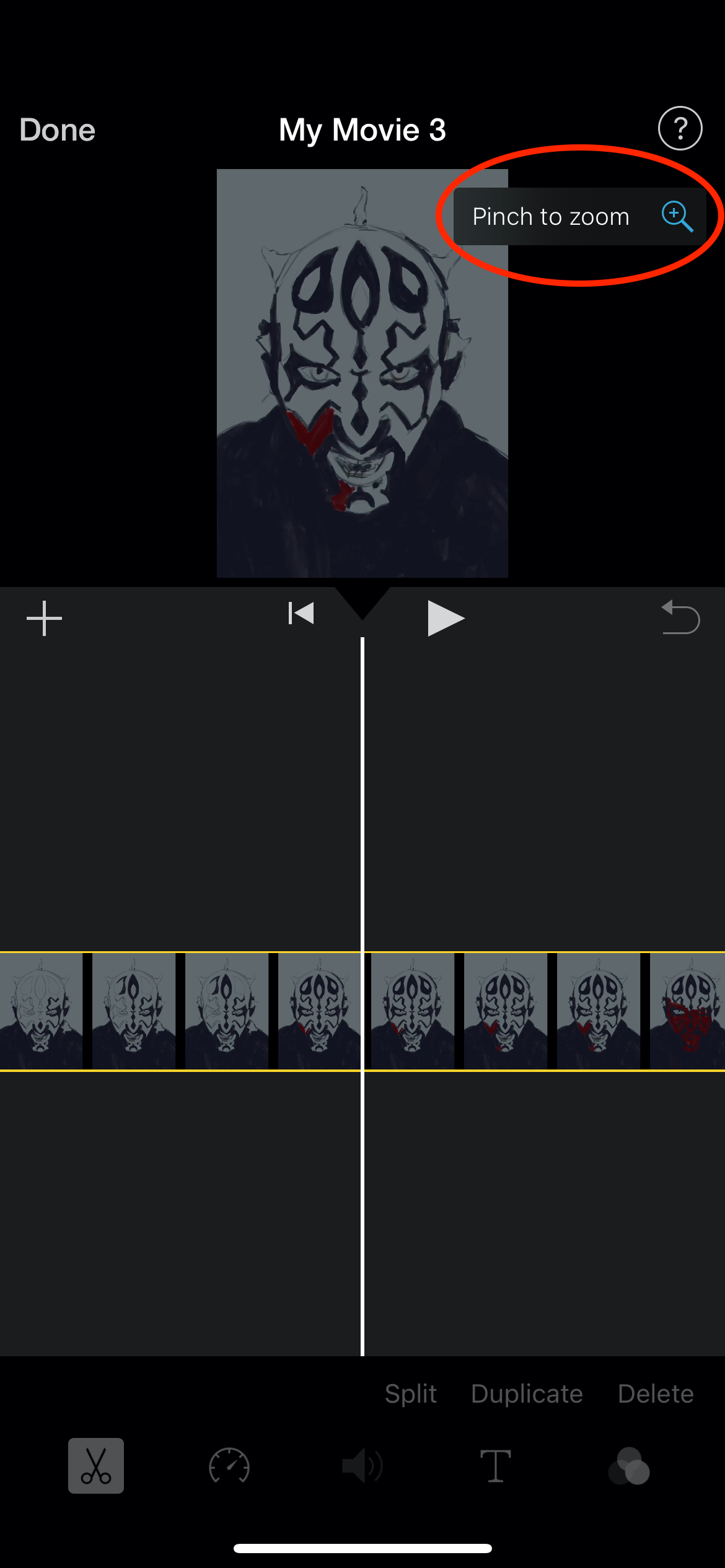 Screenshot of iMovie project showing magnifying glass button